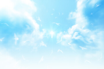 Christian cross appears bright in the sky background and soft clouds. with the light shining as...