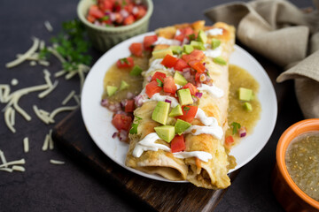 Honey lime chicken enchiladas with toppings