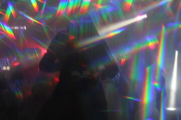 prism abstract lights nightclub dance party synthwave background lights and lasers through hologram...