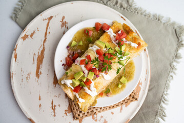 Honey lime chicken enchiladas with toppings