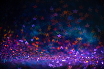 Obraz premium Festive twinkle lights background, abstract shiny backdrop with circles,modern design wallpaper with sparkling glimmers. Pink, blue and green backdrop glittering sparks with blur effect