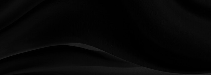 Black gray satin dark fabric texture luxurious shiny that is abstract silk cloth panorama background with patterns soft waves blur beautiful.