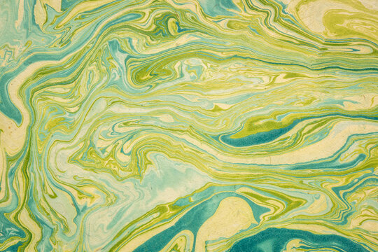 background of gold, green and blue Nepalese lokta paper Inspired from the grain of texture in granite stone,