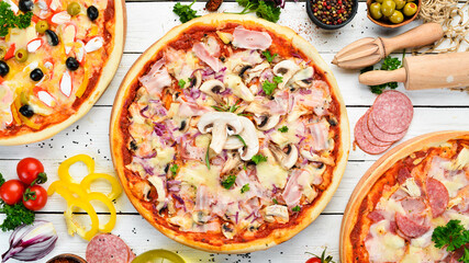 Traditional Italian pizza with mushrooms and bacon. Top view. free space for your text. Rustic style.