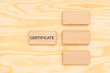 certificate printed on wooden cube