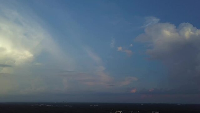 Drone ominous sky and clouds panoramic left Raleigh North Carolina at dusk sunset
