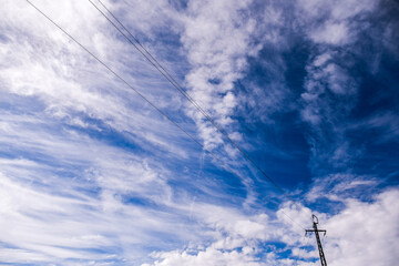 Cloudy sky with power lines, Spain