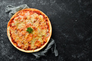 Traditional Italian Margarita Pizza. Top view. free space for your text. Rustic style.