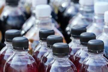 Street shop with wine in plastic bottles