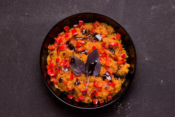 Vegetarian food concept. Soy meat with vegetables on a black background. View from above