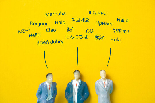 Abstract people in different languages say hello. Translation concept.