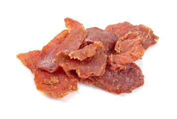 Spicy dry-cured meat isolated on a white background.