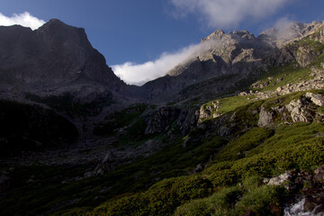 Fototapeta premium Alpine valley overlooking the mountain pass. Hanging valley of the Koshtansu river. Caucasus.