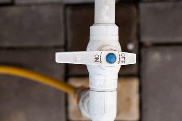 Water tap with inscription on it on off