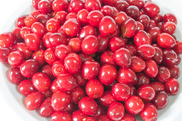 Red cherries close up background texture