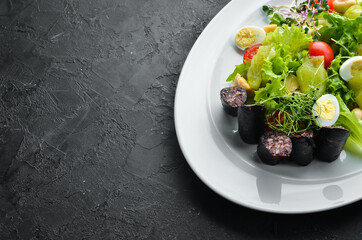 Salad of vegetables, blood sausage and mushrooms on a plate. Top view. free space for your text. Rustic style.