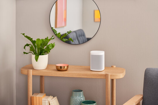 Smart speaker on shelf near mirror