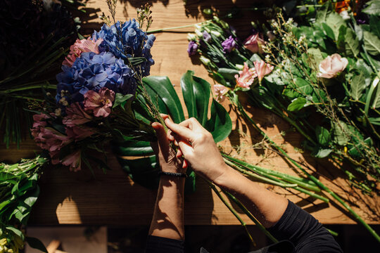 Woman arranging a bouquet