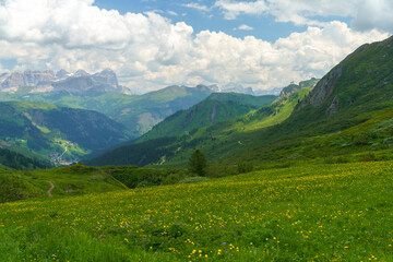 Naklejka na ściany i meble Mountain landscape along the road to Pordoi pass, Dolomites