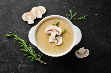 Mushroom cream soup. Soup in a bowl. Top view. Free space for your text.