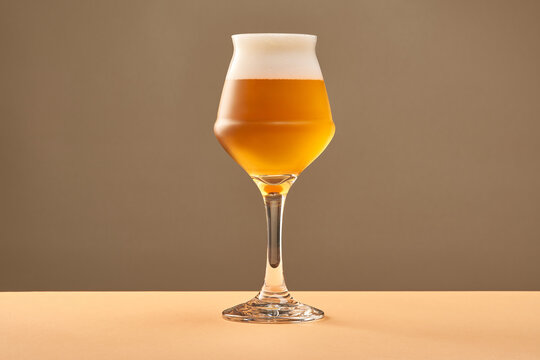 Goblet with cold amber ale