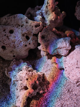 Porous stones with rainbow light