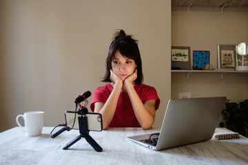 Podcast streaming young woman work from home