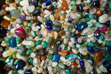 Non precious colorful stones background