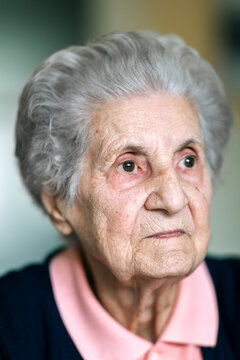 Headshot of serious senior woman