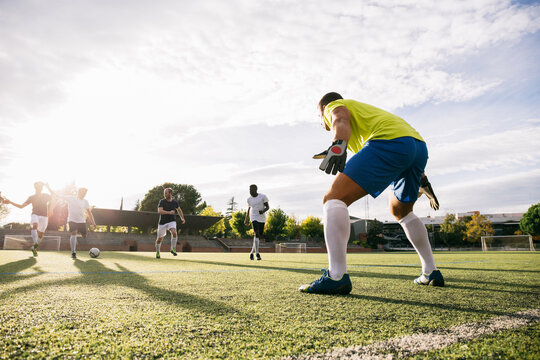 Group of men playing football