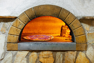 italian pizza in a wood stove