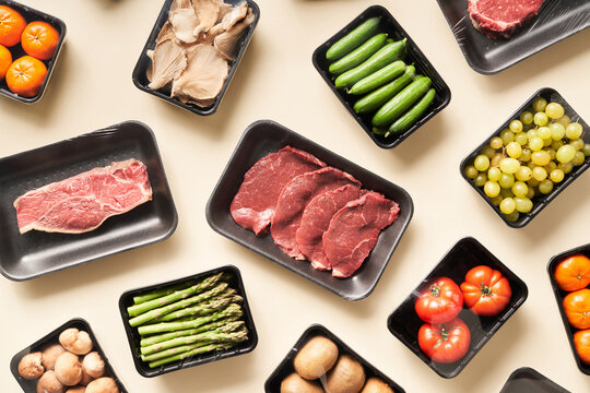 Assorted raw food in plastic wrapping
