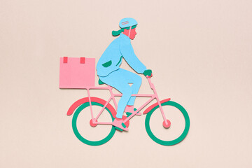 Courier on bicycle delivering parcel