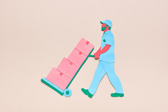 Delivery man pushing box cart