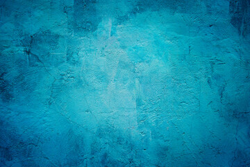 Grunge scratched blue wall texture background.