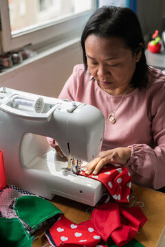 Woman sewing masks