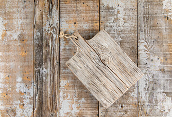 Wooden distressed weathered background kitchen board