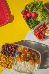 Homemade vegetarian food in lunch boxes with healthy vegetables. Vegetarian food concept. Healthy food. Top view, flat lay.