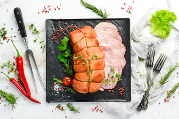 Smoked pork meat with spices and herbs. Top view. Free space for text.