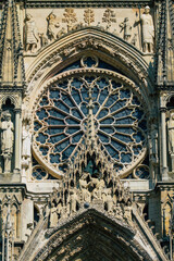View of the exterior facade of the Roman Catholic Notre Dame de Reims Cathedral, a historical monument in the Grand Est region of France and one of the oldest in Europe