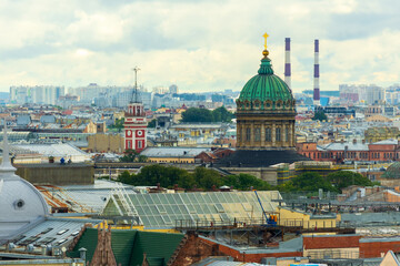 Fototapeta premium View of the dome of the Kazan Cathedral from the colonnade of St. Isaac's Cathedral in St. Petersburg, Russia