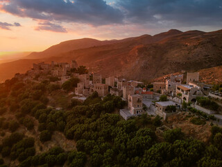 Obraz premium Amazing view over Vathia village against a dramatic sunset sky. Vathia, Mani, Laconia, Peloponnese, Greece