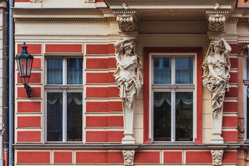 Fototapeta premium Windows and building facades in the streets of Karlovy Vary, Czechia