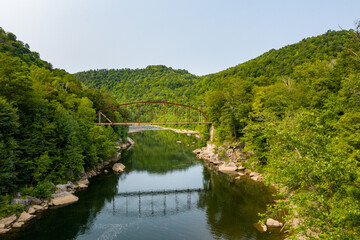 Aerial view of 1912 historic metal truss Jenkinsburg Bridge near Mt Nebo and Morgantown over Cheat River