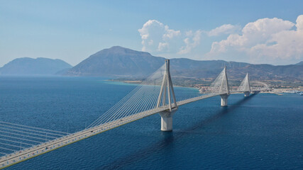 Aerial bird's eye drone photo of state of the art suspension bridge crossing the sea