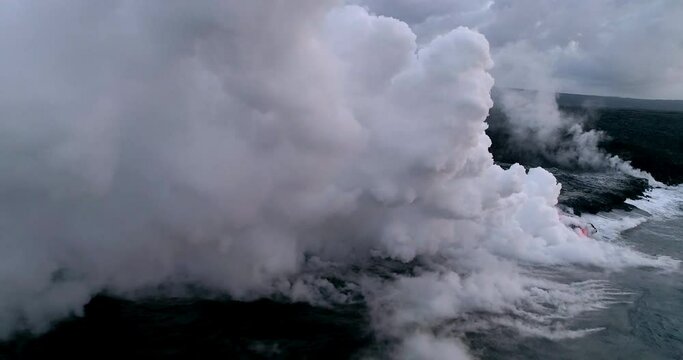 Lava flows into ocean, aerial