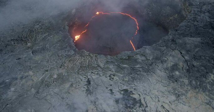 Panning aerial, magma chamber in volcano