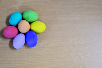 Easter eggs on wooden background
