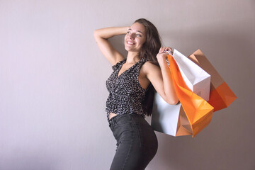 Young Woman with shopping bags and gifts - Life style