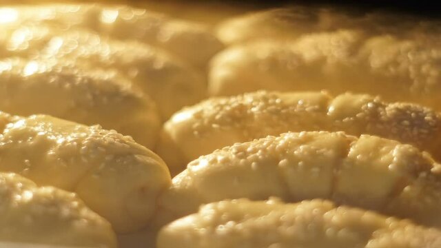 Timelapse of Homemade croissants are baked in the oven. Selective focus.